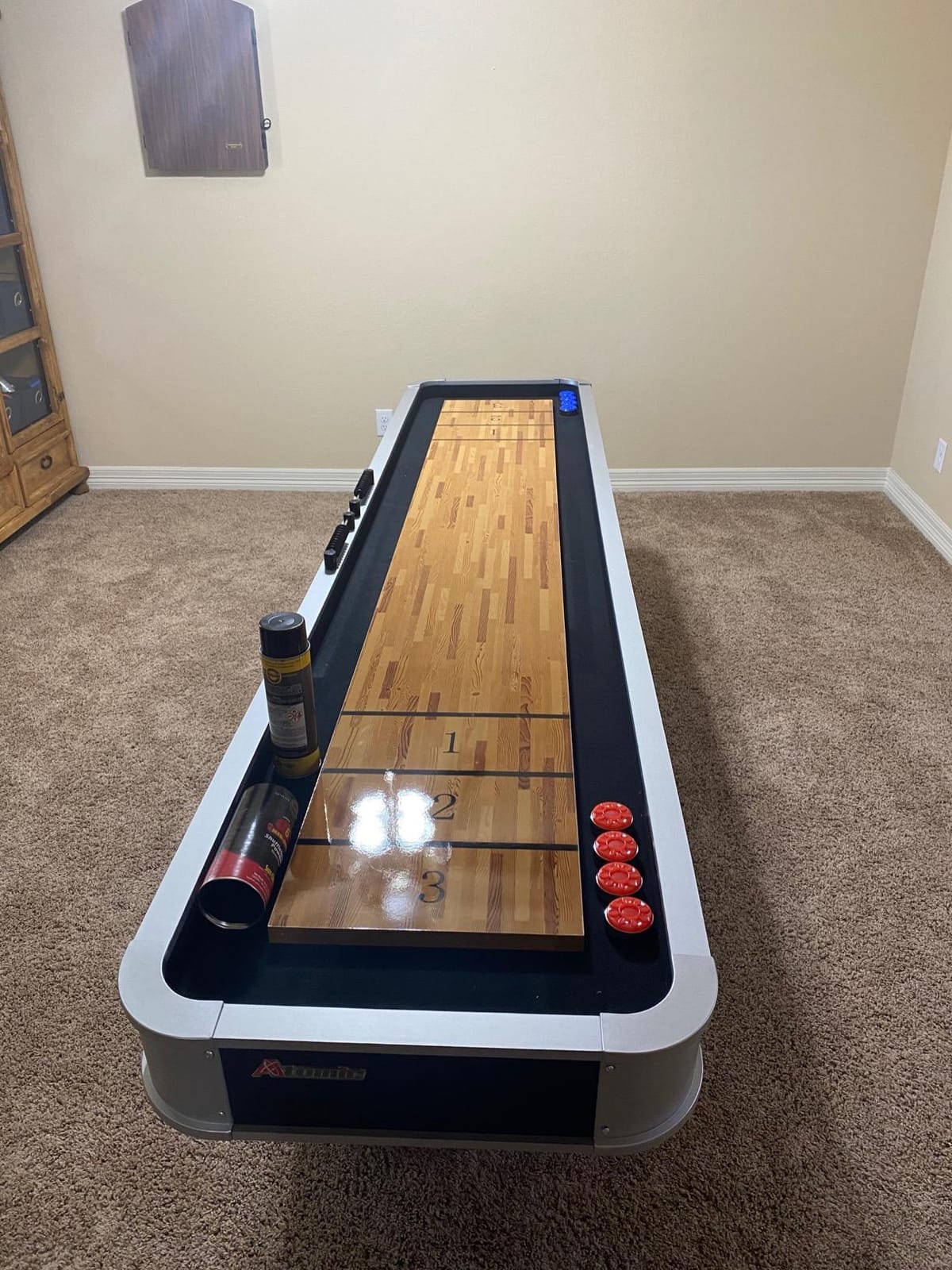 Atomic 9' LED Shuffleboard Tables with Poly-Coated Playing Surface for Smooth, Fast Puck Action and Pedestal Legs with Levelers for Optimum Stability and Level Play customer photo 1