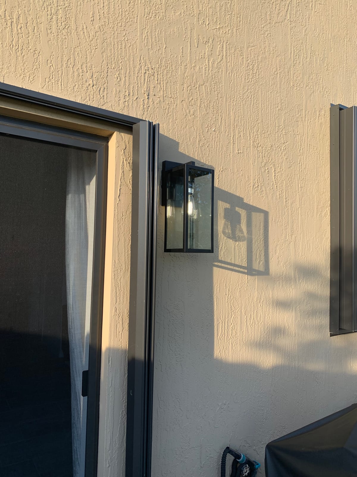 Globe Electric 44176 1-Light Outdoor/Indoor Wall Sconce, Matte Black Finish, Clear Glass Shade, Weather-Resistant Modern Exterior Light customer photo 1