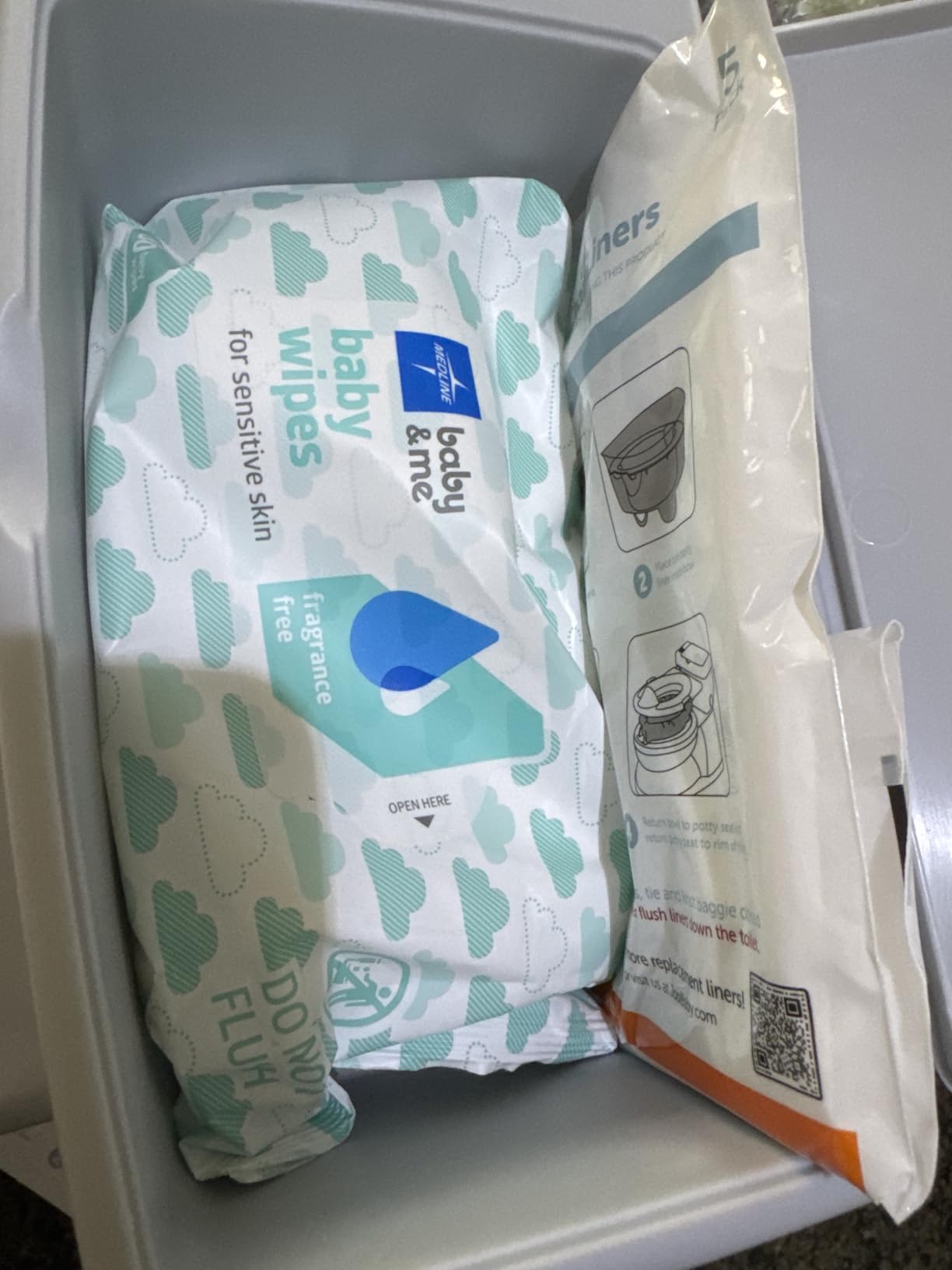 Jool Baby Real Feel 2-in-1 Potty with Wipes Storage, Flushing Sounds & Disposable Liners - Realistic Toilet - Easy to Clean & Assemble (Gray) customer photo 1