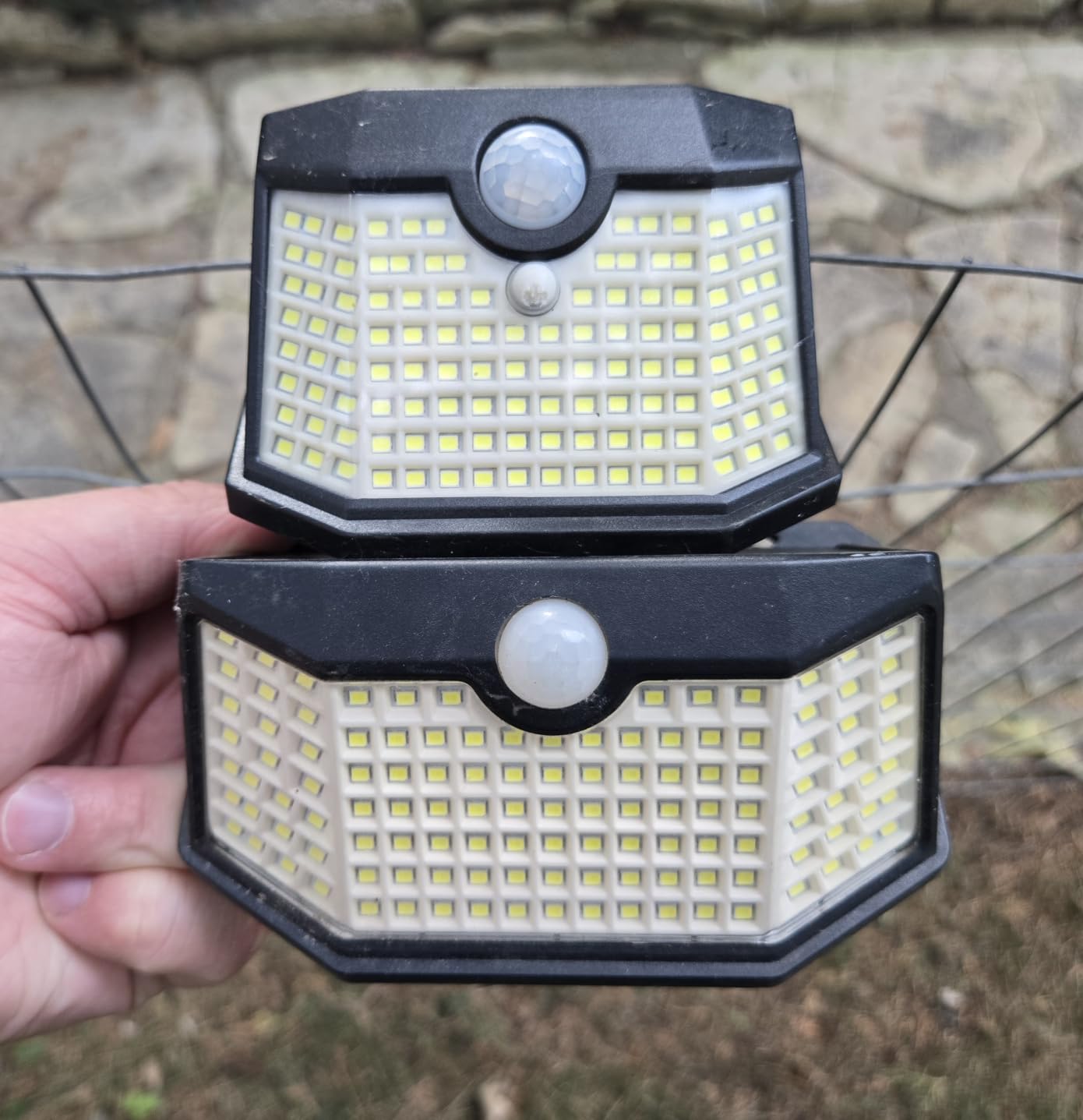 HMCITY 120 LED Outdoor Solar Lights with Motion Sensor and 3 Lighting Modes, IP65 Waterproof Wide Solar Wall Lights Ideal for Garden Patio Yard (Front Button 6Packs, Black Shell-Daylight White) customer photo 2